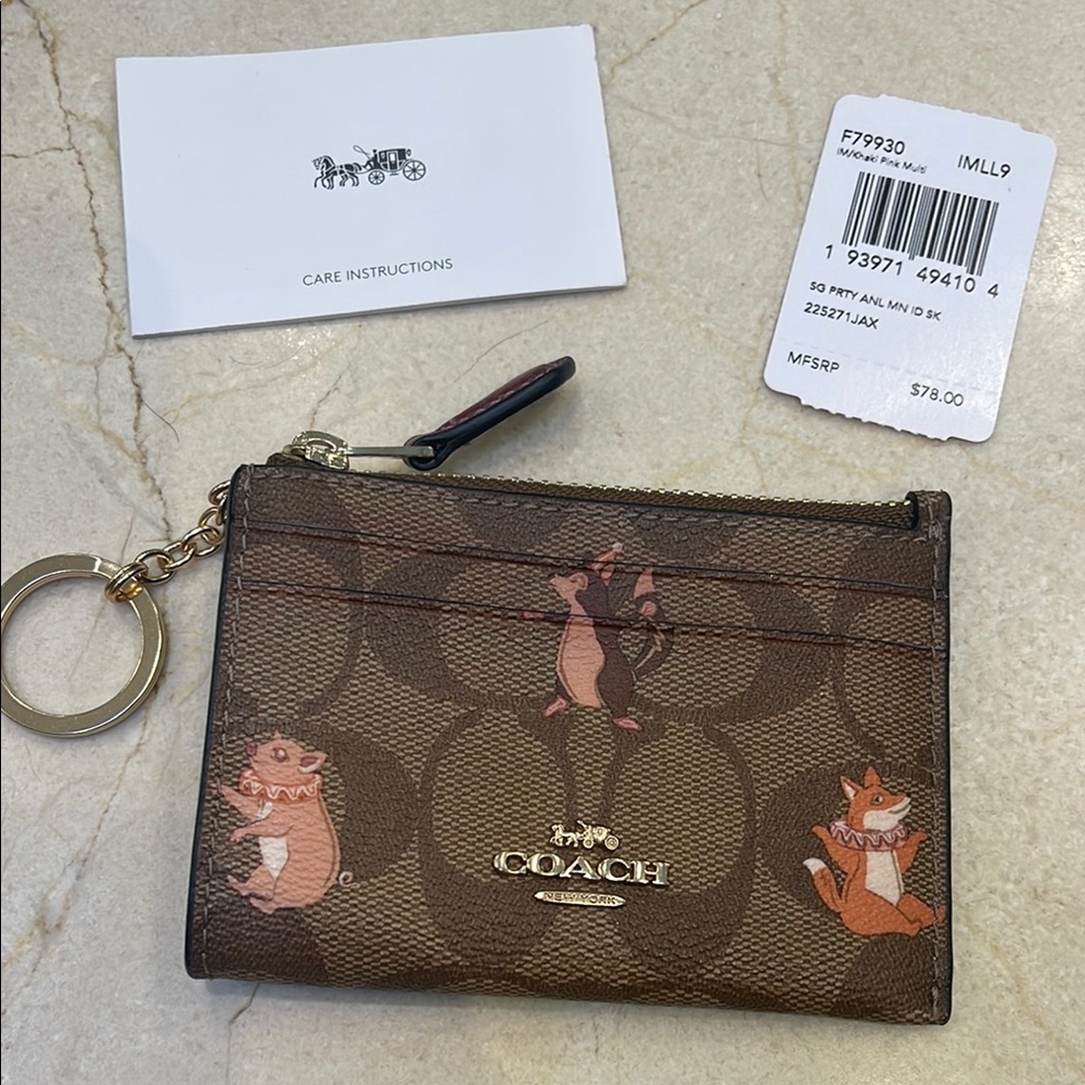 New with tags Coach Brown Animal Print Keychain Wallet
